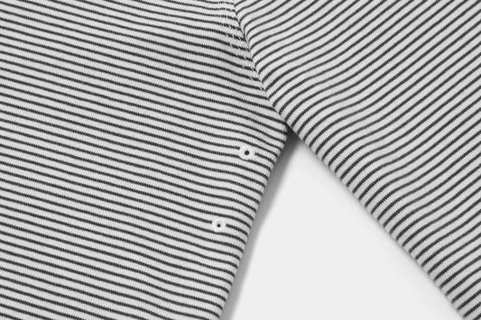 Two Embroidered Vents Under Each Arm Allow Air To Circulate.