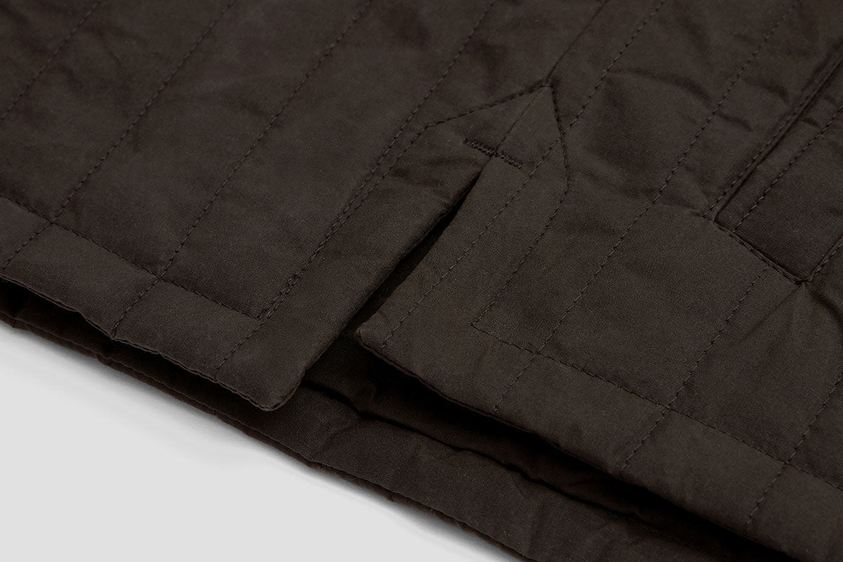 Stepped hem keeps lower back covered when reaching forward.