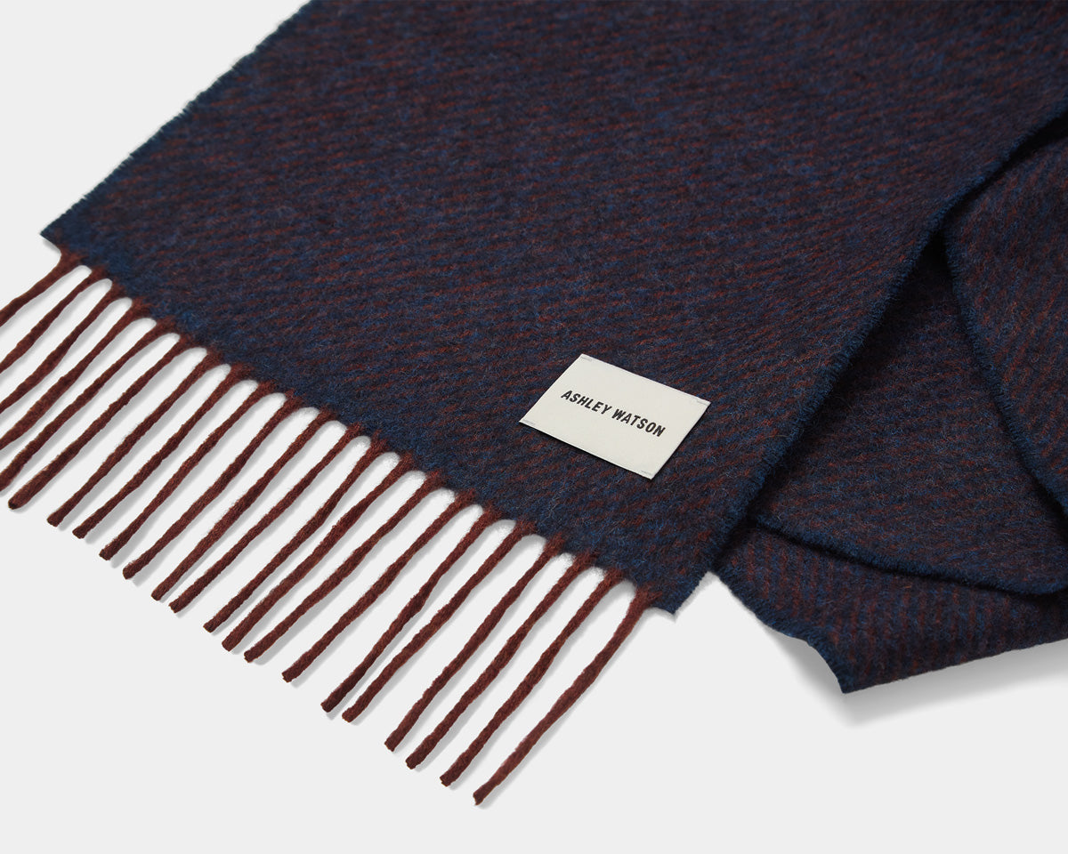 Two-tone diagonal stripe, woven in merino wool.