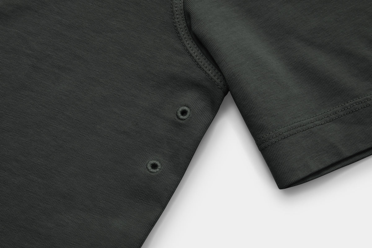 Two Embroidered Vents Under Each Arm Allow Air To Circulate.