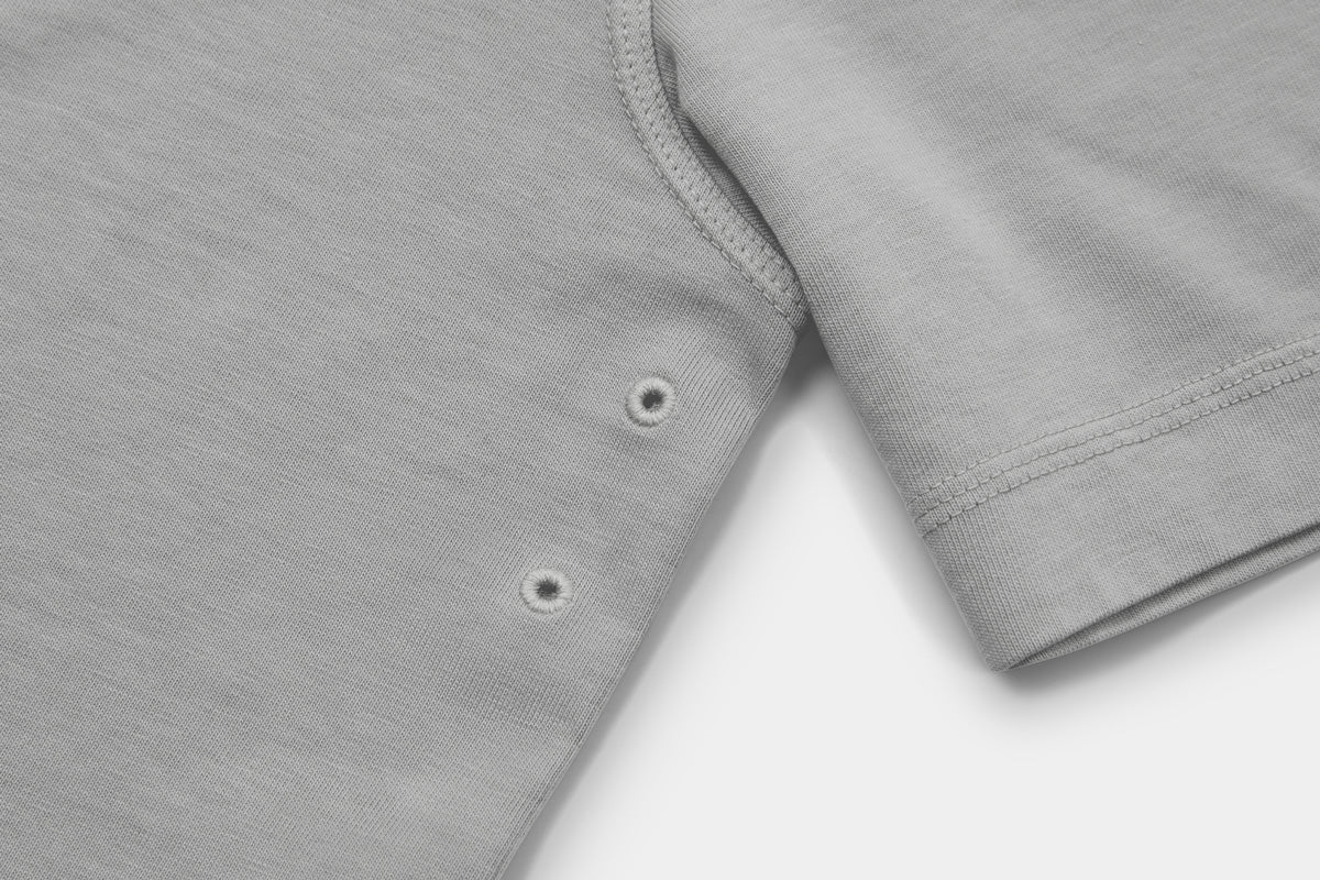 Two Embroidered Vents Under Each Arm Allow Air To Circulate.