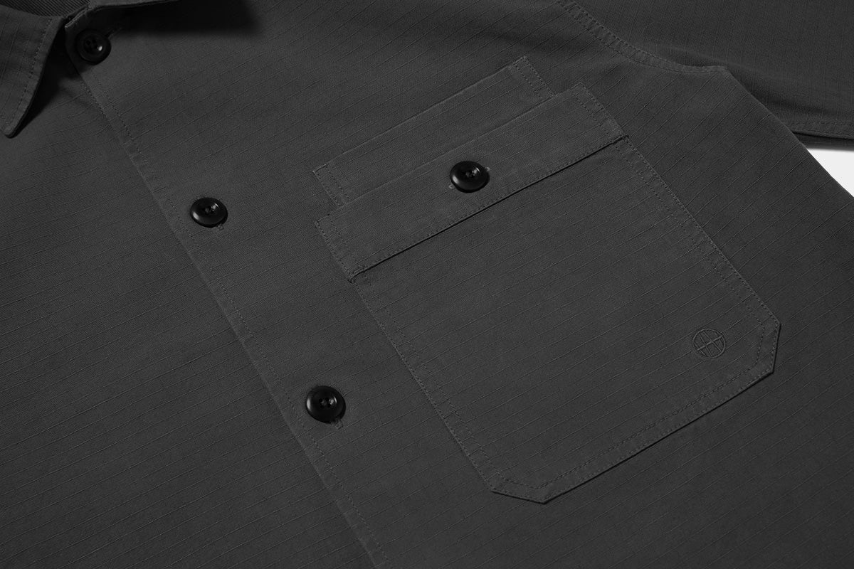 Large buttoned pocket keeps the essentials secure, we added a second pocket for quick access to passports and tickets.