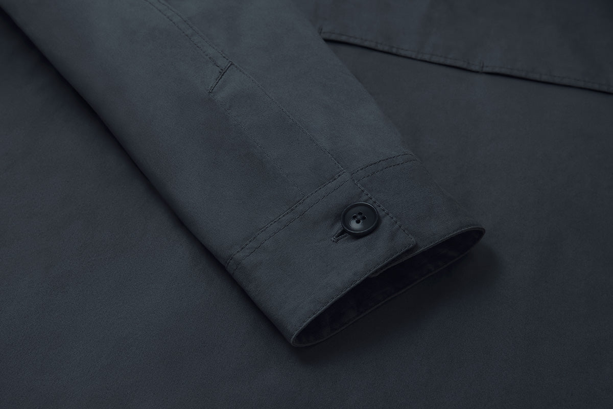 Corozo buttons are engraved with a diamond pattern around the edge for grip. Seams reinforced with twin needle stitch.