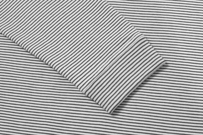 Ribbed cuff holds sleeve shape. All Seams Reinforced With Triple Needle Stitch.