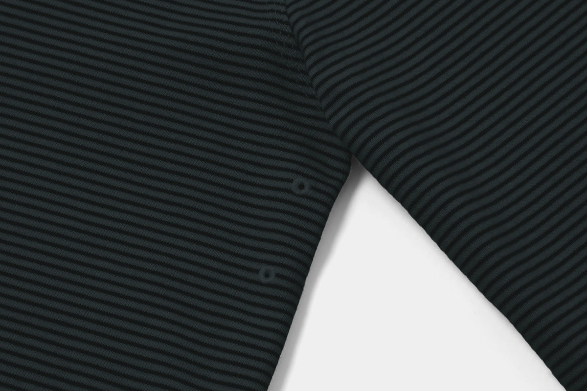 Two Embroidered Vents Under Each Arm Allow Air To Circulate.