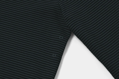Two Embroidered Vents Under Each Arm Allow Air To Circulate.