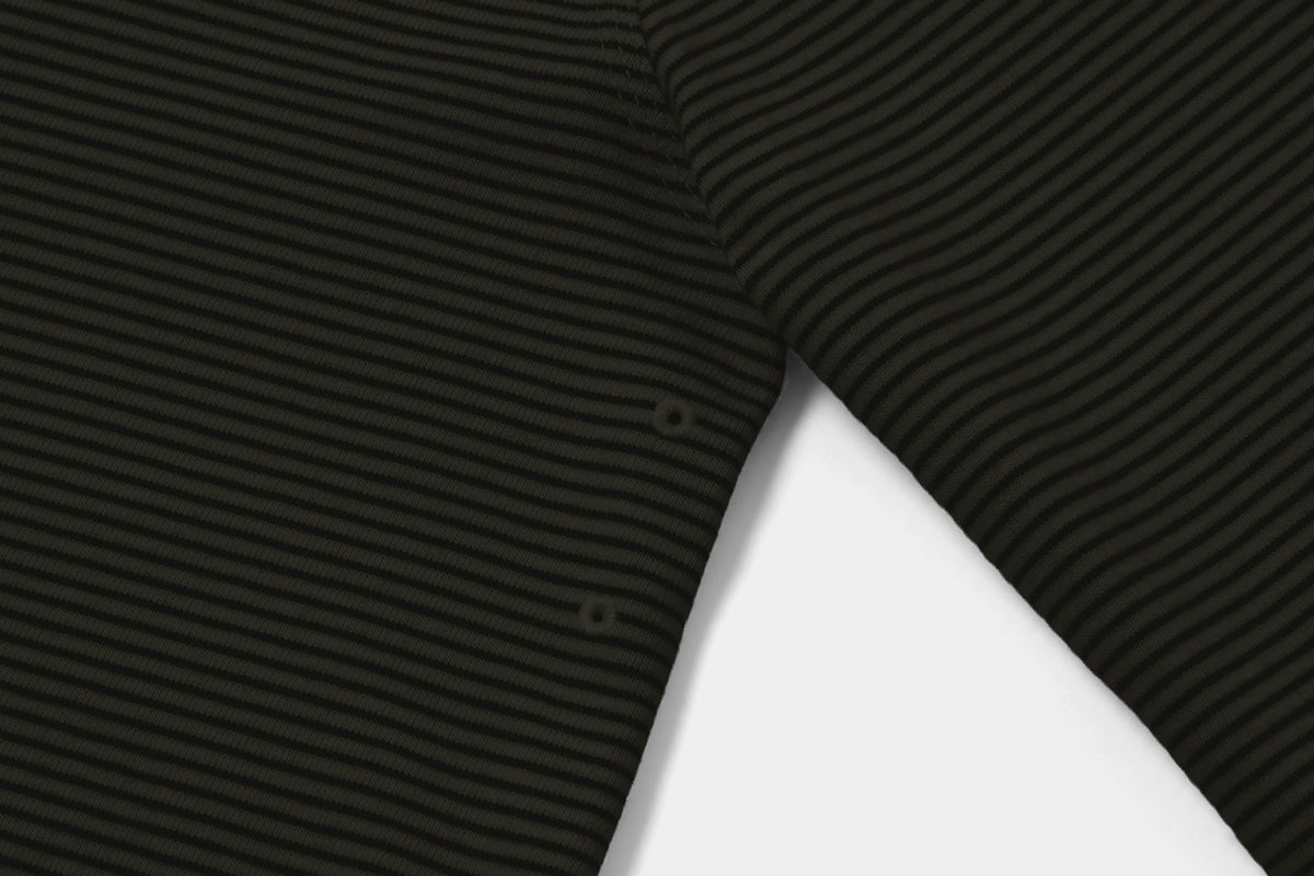 Two Embroidered Vents Under Each Arm Allow Air To Circulate.