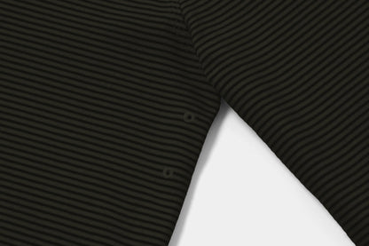 Two Embroidered Vents Under Each Arm Allow Air To Circulate.
