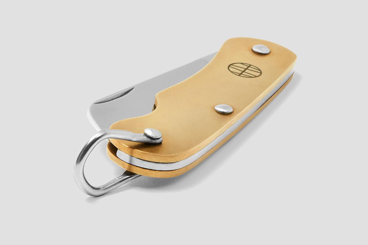 Stainless steel loop shackle attaches to a rucksack or key chain.