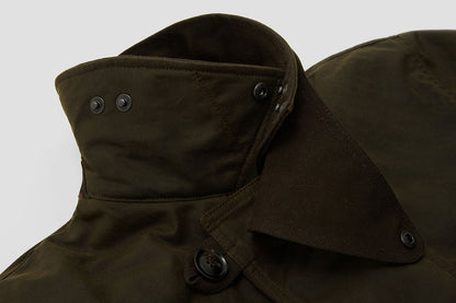 Adjustable neck baffle - tighten when wearing fewer layers in the warmer months.