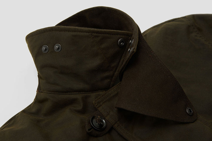 Adjustable neck baffle - tighten when wearing fewer layers in the warmer months.
