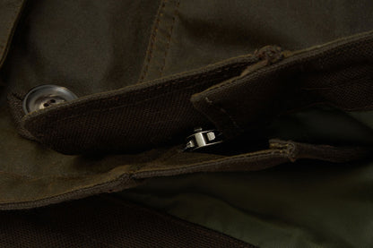 A double zip has a storm guard on the front and back to stop wind + rain.