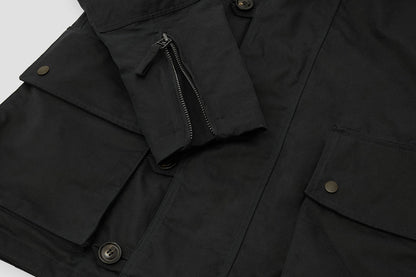 Zipped sleeve gussets and internal storm cuffs stop wind + rain.