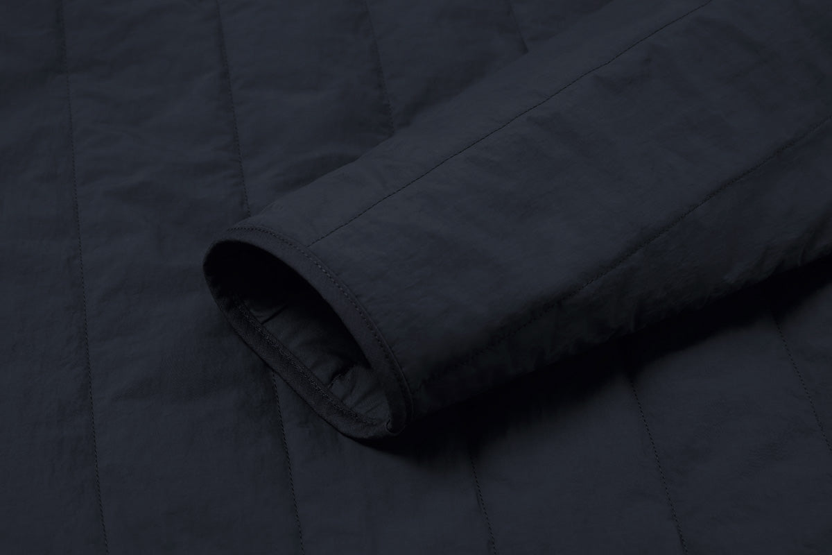 Water resistant durable Nilon shell - strong, quick-drying, resistant to wear. Cuff, placket and hem are bound with a hardwearing ripstop fabric.