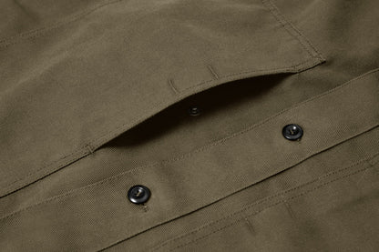 Side-entry chest pockets fastened with a pop-stud - easy access / keep valuables secure.
