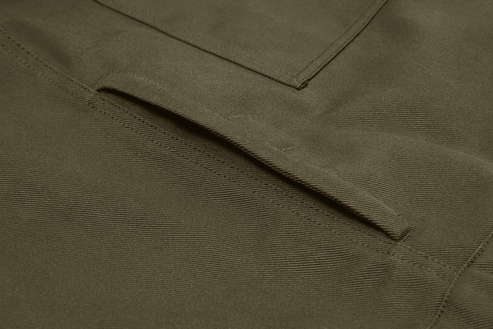 Deep hand-warmer pockets come into their own when the engine stops.