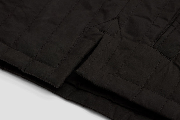 Stepped hem keeps lower back covered when reaching forward.
