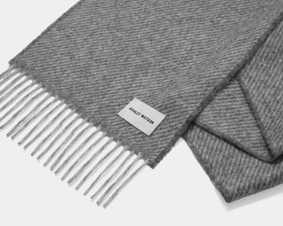 Two-tone diagonal stripe, woven in merino wool.