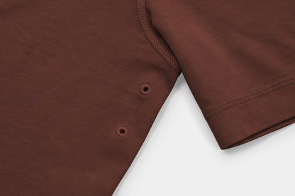 Two Embroidered Vents Under Each Arm Allow Air To Circulate.