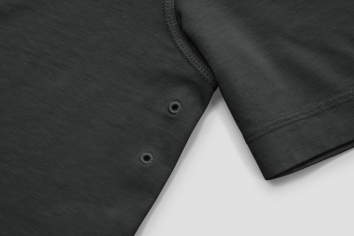 Two Embroidered Vents Under Each Arm Allow Air To Circulate.