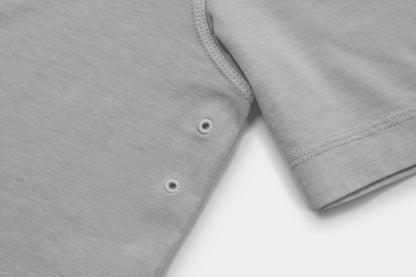 Two Embroidered Vents Under Each Arm Allow Air To Circulate.