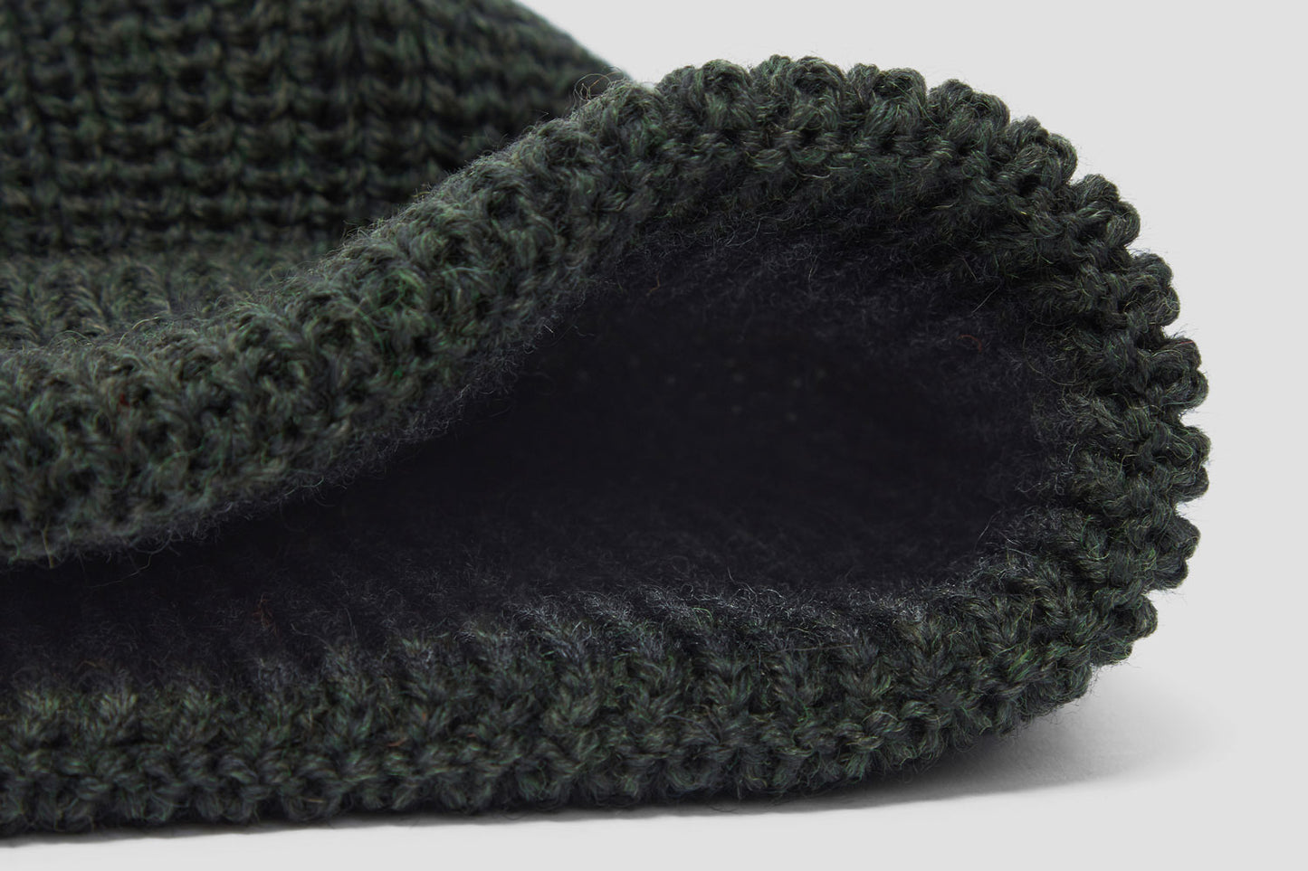 A section of soft Merino Wool circles the inside of the hat - extra warm, no itching.
