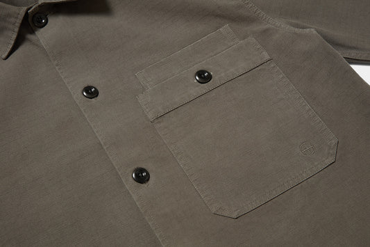 Large buttoned pocket keeps the essentials secure, we added a second pocket for quick access to passports and tickets.