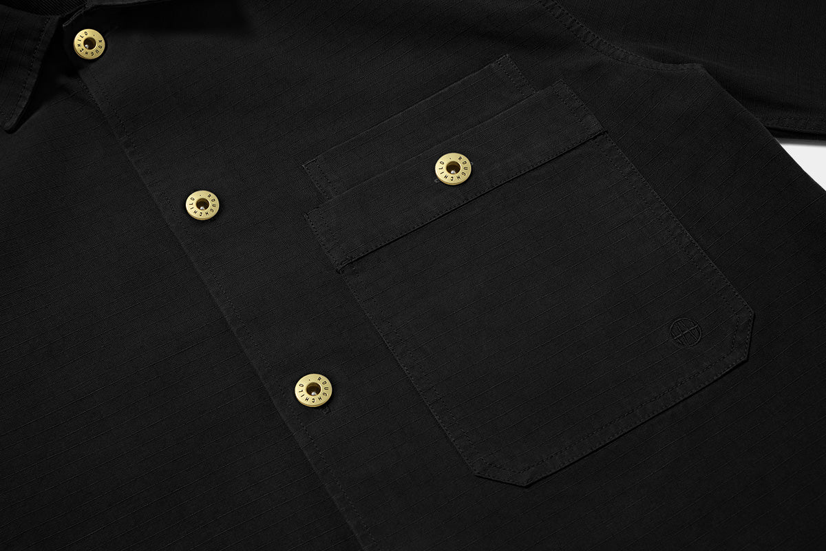 Solid brass buttons on the placket, pocket, cuff are stamped with Roughchild type. Large chest pocket keeps essentials secure.