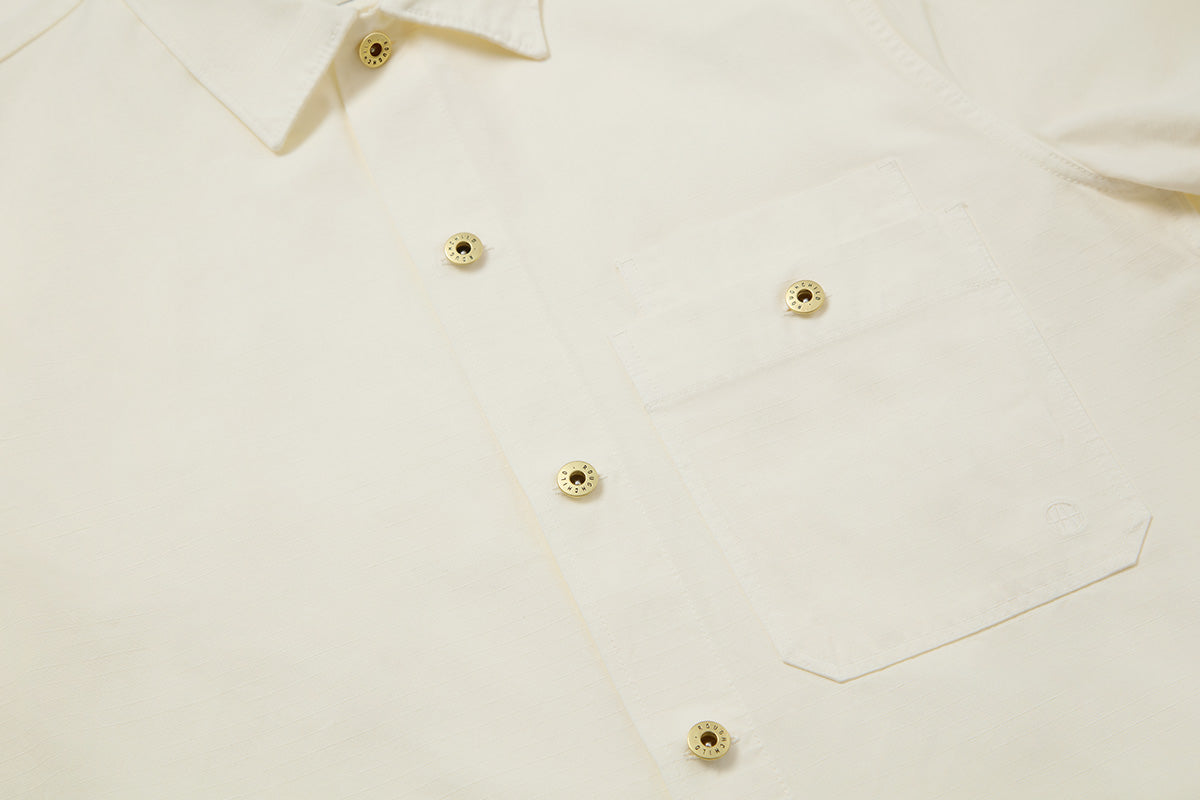 Large buttoned pocket keeps the essentials secure, we added a second pocket for quick access to passports and tickets.